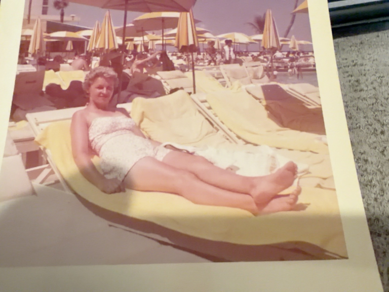 Viola Samuel reclining on a lounge chair outdoors.