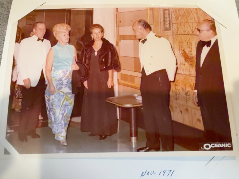 Frank and Viola Samuel entering during a cruise, with other people also visible.