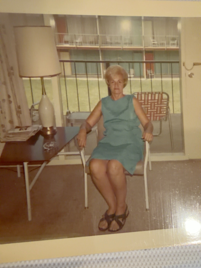 Viola Samuel seated in an armchair.
